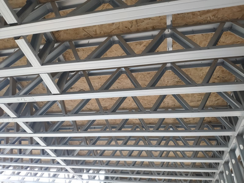 Vigas reticulares metálicas para entrepiso con paneles de madera en Bogotá Colombia. Montajes, Ingeniería y Construcción. MIC SAS. Vigas reticulares metálicas para entrepiso con paneles de madera en Bogotá Colombia. Montajes, Ingeniería y Construcción. MIC SAS.