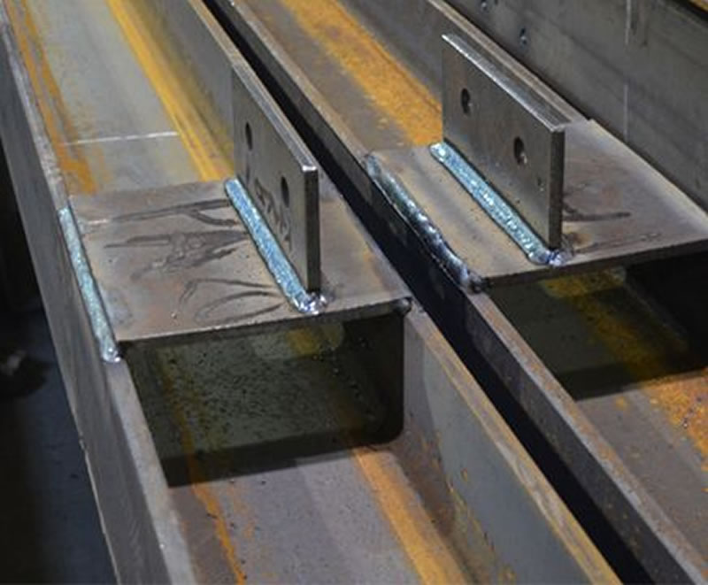Placas soldadas en vigas metálicas fabricadas para proyectos en Bogotá Colombia. Montajes, Ingeniería y Construcción. MIC SAS. Placas soldadas en vigas metálicas fabricadas para proyectos en Bogotá Colombia. Montajes, Ingeniería y Construcción. MIC SAS.