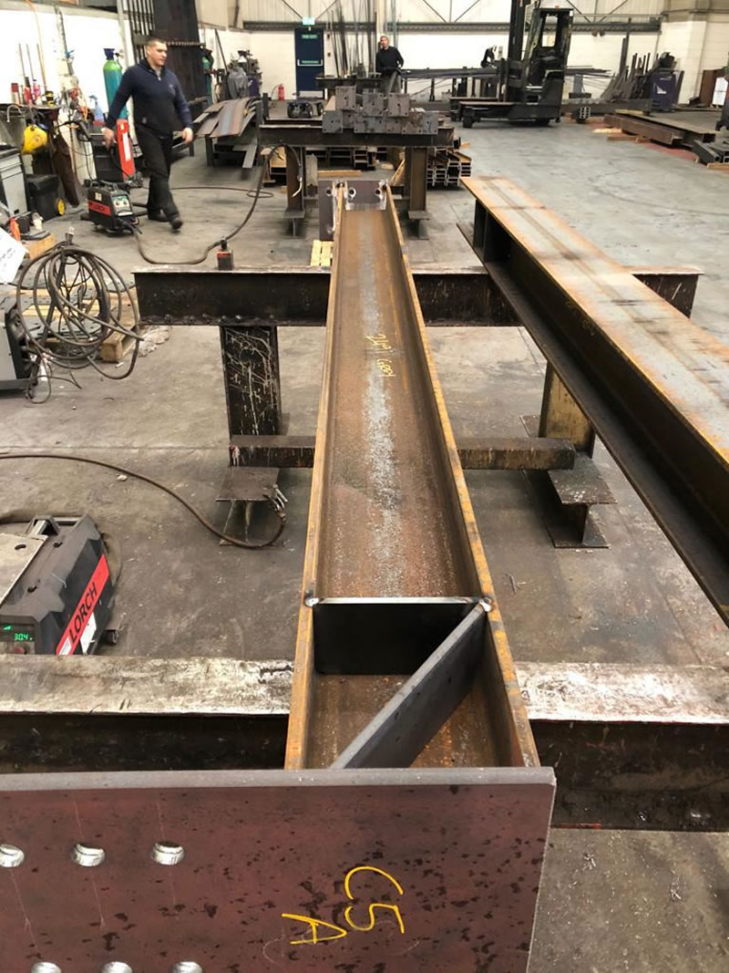 Vigas metálicas a medida con refuerzos proyectos especiales en Bogotá Colombia. Montajes, Ingeniería y Construcción. MIC SAS. Vigas metálicas a medida con refuerzos proyectos especiales en Bogotá Colombia. Montajes, Ingeniería y Construcción. MIC SAS.