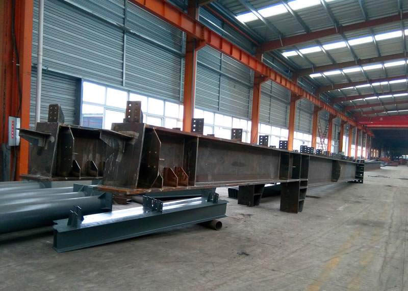 Viga acero estructural larga fabricada conexiones proyectos especiales en Bogotá, Colombia. Montajes, Ingeniería y Construcción. MIC SAS. Viga acero estructural larga fabricada conexiones proyectos especiales en Bogotá, Colombia. Montajes, Ingeniería y Construcción. MIC SAS.
