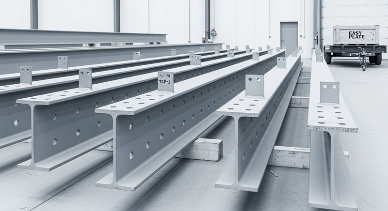 Linea de vigas prefabricadas en acero con placas de conexion listas en Bogotá, Colombia. Montajes, Ingeniería y Construcción. MIC SAS. Linea de vigas prefabricadas en acero con placas de conexion listas en Bogotá, Colombia. Montajes, Ingeniería y Construcción. MIC SAS.