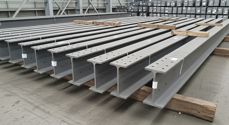Vigas prefabricadas de acero con placas y pintura anticorrosiva en Bogotá, Colombia. Montajes, Ingeniería y Construcción. MIC SAS. Vigas prefabricadas de acero con placas y pintura anticorrosiva en Bogotá, Colombia. Montajes, Ingeniería y Construcción. MIC SAS.