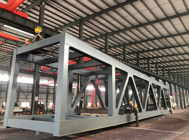 Estructura metalica prefabricada con vigas de acero en taller en Bogotá, Colombia. Montajes, Ingeniería y Construcción. MIC SAS. Estructura metalica prefabricada con vigas de acero en taller en Bogotá, Colombia. Montajes, Ingeniería y Construcción. MIC SAS.