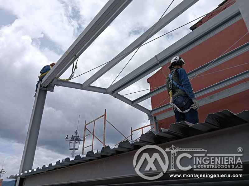 Fabricación y montaje de cubiertas metálicas para techos en edificios en Bogotá, Colombia. Montajes, Ingeniería y Construcción MIC SAS. Fabricación y montaje de cubiertas metálicas para techos en edificios en Bogotá, Colombia. Montajes, Ingeniería y Construcción MIC SAS.