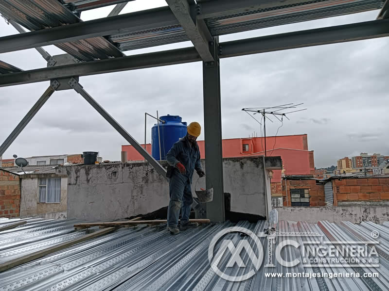 Fabricación y montaje de cubiertas metálicas para techos en edificios en Bogotá, Colombia. Montajes, Ingeniería y Construcción MIC SAS. Fabricación y montaje de cubiertas metálicas para techos en edificios en Bogotá, Colombia. Montajes, Ingeniería y Construcción MIC SAS.