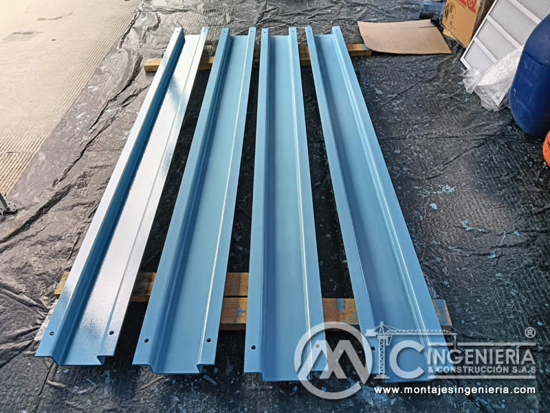Limpieza y pintura de estructuras metálicas para bodegas y naves industriales en Bogotá, Colombia. Montajes, Ingeniería y Construcción MIC SAS. Limpieza y pintura de estructuras metálicas para bodegas y naves industriales en Bogotá, Colombia. Montajes, Ingeniería y Construcción MIC SAS.