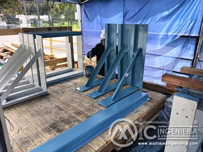 Limpieza y pintura de estructuras metálicas para bodegas y naves industriales en Bogotá, Colombia. Montajes, Ingeniería y Construcción MIC SAS. Limpieza y pintura de estructuras metálicas para bodegas y naves industriales en Bogotá, Colombia. Montajes, Ingeniería y Construcción MIC SAS.