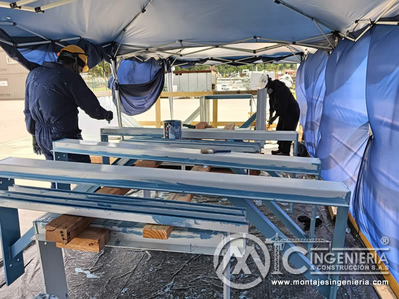 Limpieza y pintura de estructuras metálicas para bodegas y naves industriales en Bogotá, Colombia. Montajes, Ingeniería y Construcción MIC SAS. Limpieza y pintura de estructuras metálicas para bodegas y naves industriales en Bogotá, Colombia. Montajes, Ingeniería y Construcción MIC SAS.