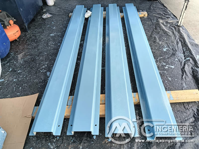 Limpieza y pintura de estructuras metálicas para bodegas y naves industriales en Bogotá, Colombia. Montajes, Ingeniería y Construcción MIC SAS. Limpieza y pintura de estructuras metálicas para bodegas y naves industriales en Bogotá, Colombia. Montajes, Ingeniería y Construcción MIC SAS.