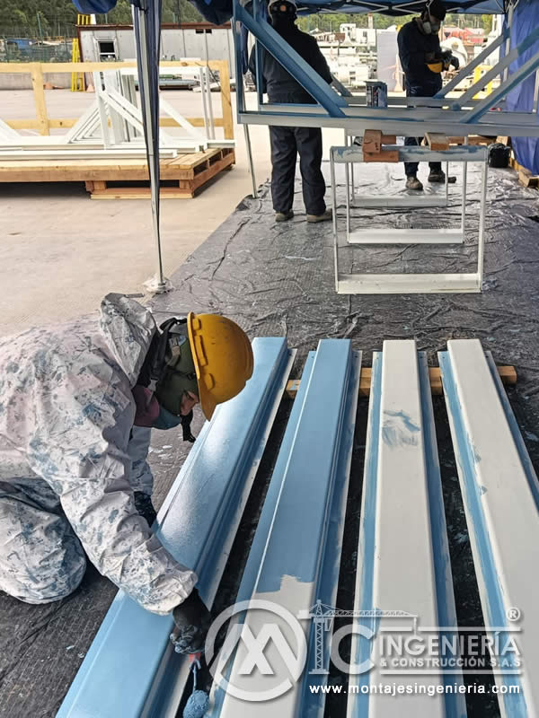 Limpieza y pintura de estructuras metálicas para bodegas y naves industriales en Bogotá, Colombia. Montajes, Ingeniería y Construcción MIC SAS. Limpieza y pintura de estructuras metálicas para bodegas y naves industriales en Bogotá, Colombia. Montajes, Ingeniería y Construcción MIC SAS.