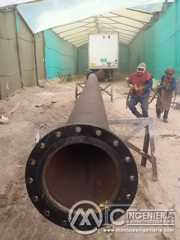 Sandblasting y pintura industrial de componentes industriales estructurales en Bogotá, Colombia. Montajes, Ingeniería y Construcción MIC SAS. Sandblasting y pintura industrial de componentes industriales estructurales en Bogotá, Colombia. Montajes, Ingeniería y Construcción MIC SAS.
