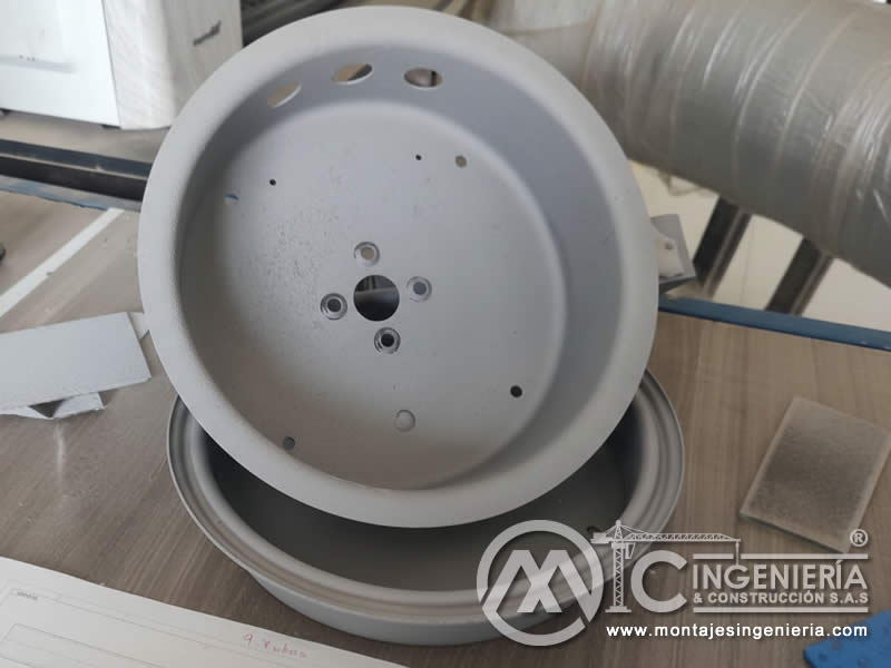 Sandblasting de piezas metálicas para equipos industriales en Bogotá, Colombia. MIC SAS.