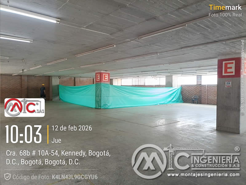 Adecuación de parqueadero interior con preparación de muros y pisos para acabados en Bogotá, Colombia. Montajes, Ingeniería y Construcción MIC SAS.