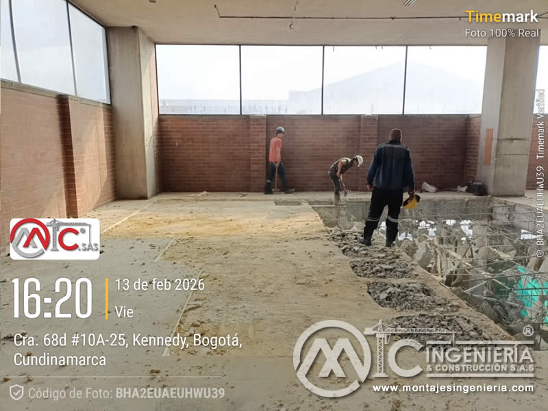 Adecuación de piso y fosas de cimentación en parqueadero de edificio en Bogotá, Colombia. Montajes, Ingeniería y Construcción MIC SAS.