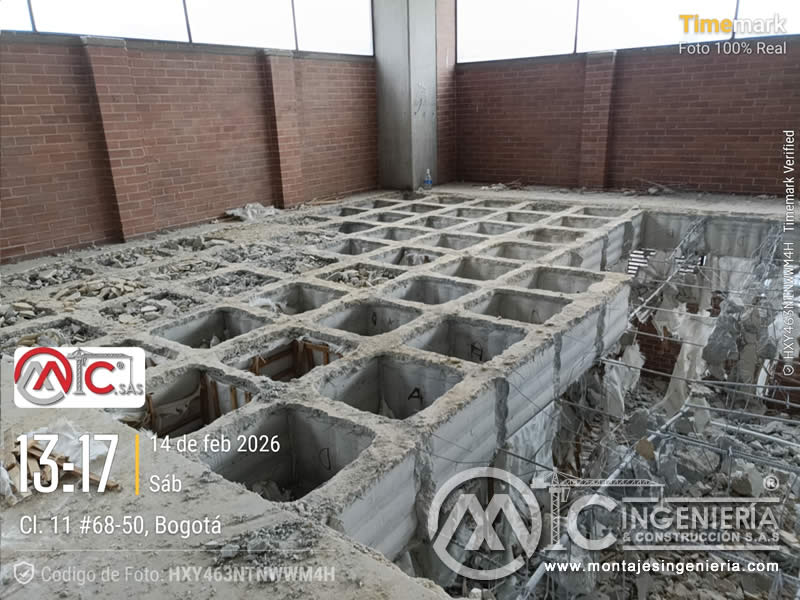 Construcción de fosas con vigas de cimentación y refuerzo estructural para naves industriales en Bogotá, Colombia. Montajes, Ingeniería y Construcción MIC SAS.