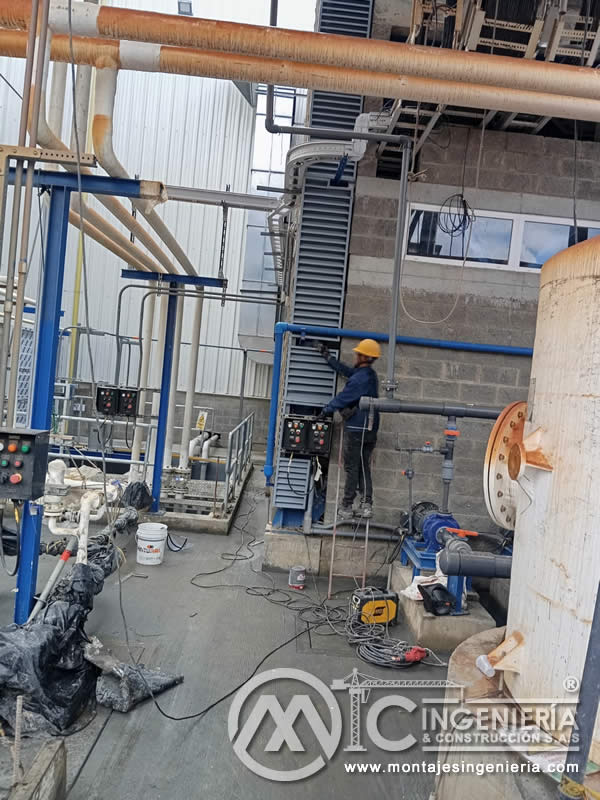 Instalación de sistemas eléctricos y ductos de ventilación en plantas industriales en Bogotá, Colombia. Montajes, Ingeniería y Construcción MIC SAS.
