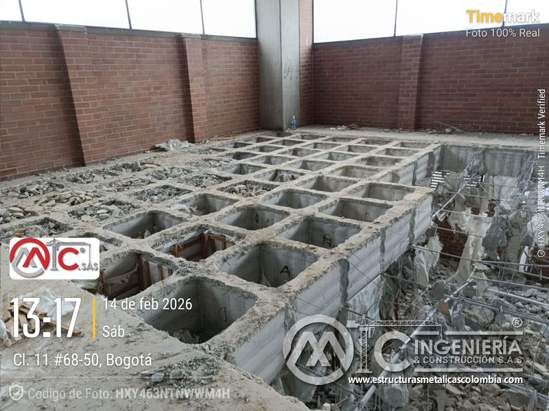 Apertura de fosas en concreto para rampas vehiculares vehicular acceso en Bogotá, Colombia. Montajes, Ingeniería y Construcción MIC SAS.