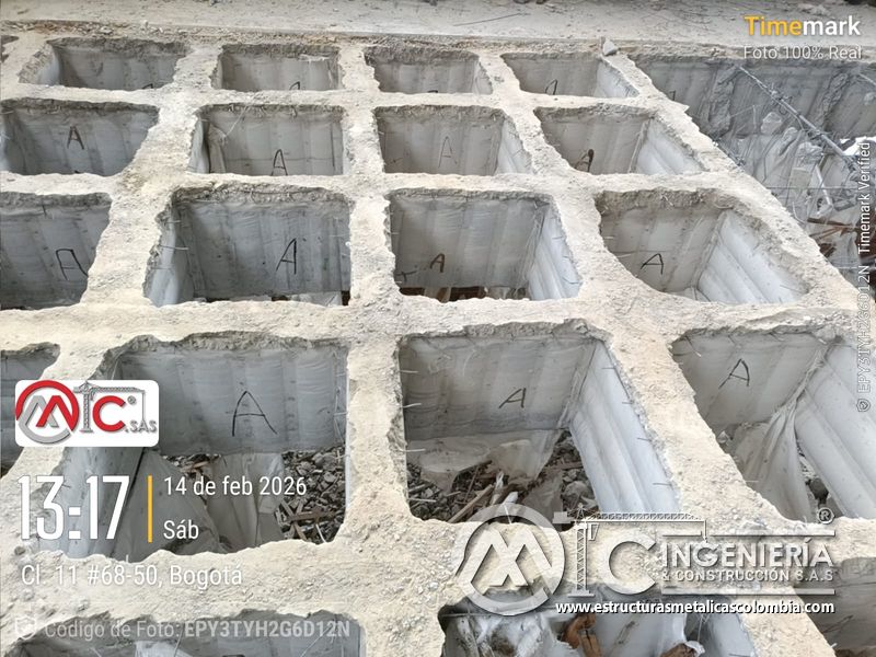 Excavacion y retiro de escombros para rampas de parqueadero acceso en Bogotá, Colombia. Montajes, Ingeniería y Construcción MIC SAS.