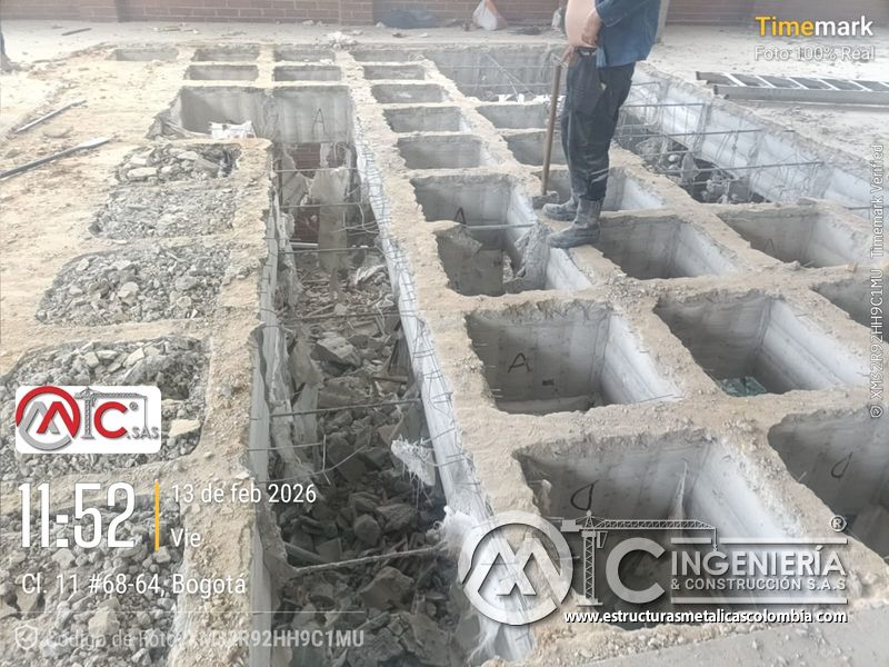 Intervencion de placa de concreto para rampas vehiculares edificio en Bogotá, Colombia. Montajes, Ingeniería y Construcción MIC SAS.
