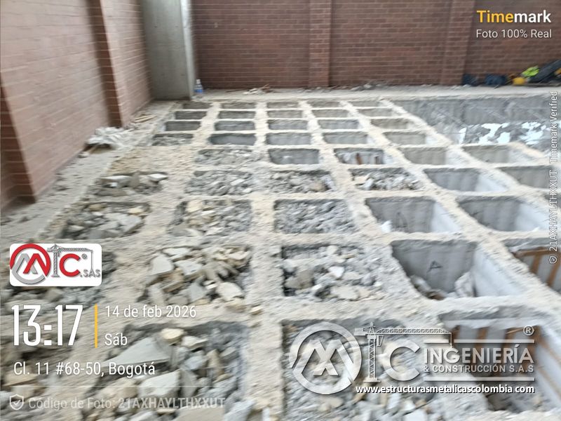 Intervencion de placa de concreto para rampas vehiculares metálica en Bogotá, Colombia. Montajes, Ingeniería y Construcción MIC SAS.