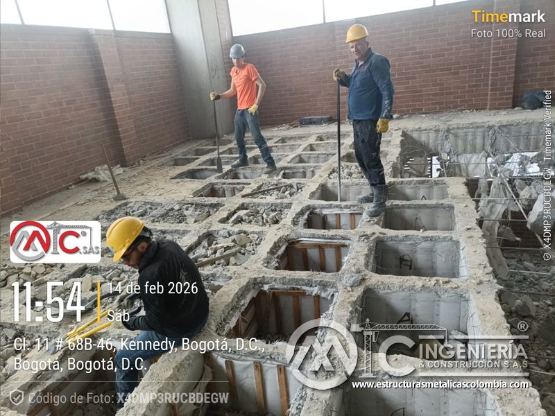 Intervencion de placa de concreto para rampas vehiculares obra civil en Bogotá, Colombia. Montajes, Ingeniería y Construcción MIC SAS.