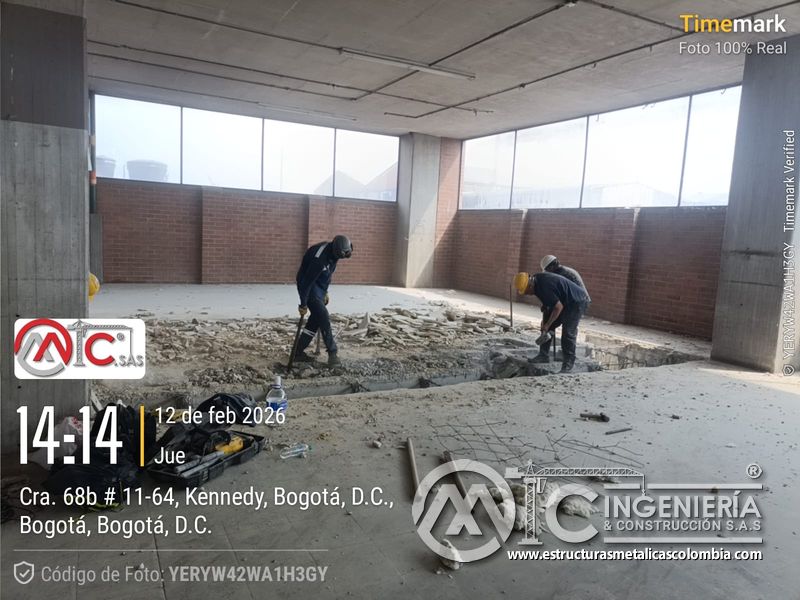 Perforación y anclajes en concreto para rampas de parqueadero comercial en Bogotá, Colombia. Montajes, Ingeniería y Construcción MIC SAS.