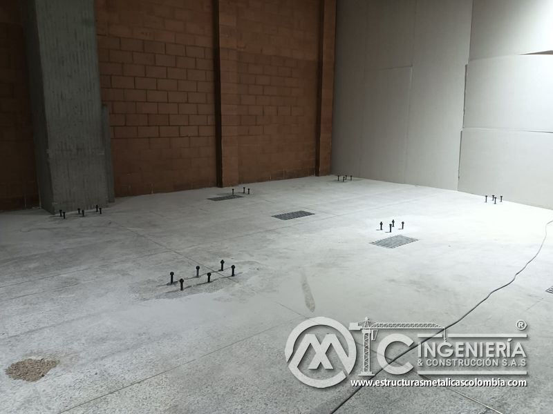 Preparación de losa existente para rampas de acceso vehicular vehicular en Bogotá, Colombia. Montajes, Ingeniería y Construcción MIC SAS.
