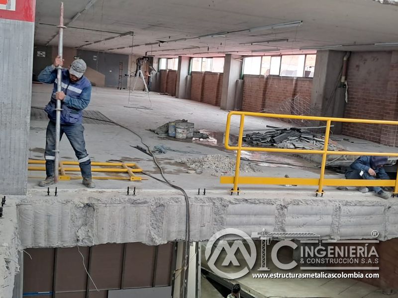 Revision de estructura y pisos para rampas vehiculares seguridad acceso en Bogotá, Colombia. Montajes, Ingeniería y Construcción MIC SAS.