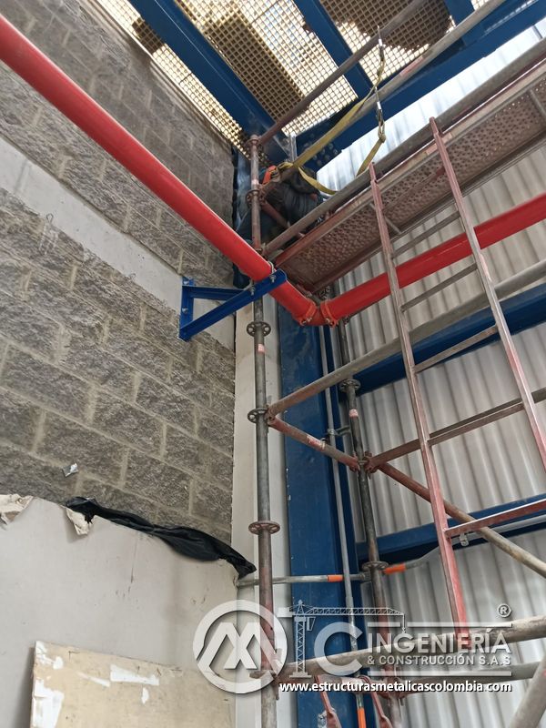 Soportes altos y estructura metálica junto a pasarela del Edificio eléctrico CCM - Brinsa con fabricación e instalación profesional en Bogotá, Colombia. Montajes, Ingeniería y Construcción. MIC SAS. Soportes altos y estructura metálica junto a pasarela del Edificio eléctrico CCM - Brinsa en Bogotá, Colombia. Montajes, Ingeniería y Construcción. MIC SAS.