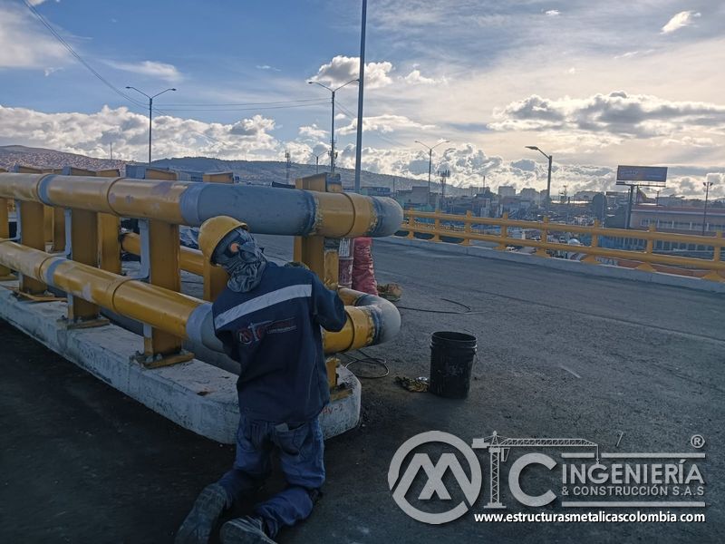 Descubra la imprimación anticorrosiva aplicada sobre empalmes recién terminados con precisión y calidad en Bogotá, Colombia. Montajes, Ingeniería y Construcción. MIC SAS.