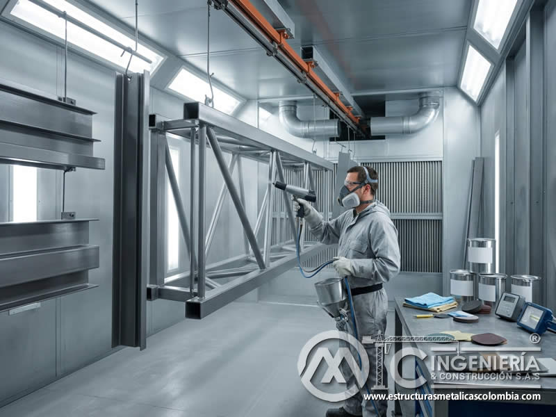 Importancia de la Resistencia a los Rayos UV en Pintura en Polvo Electrostática para Aplicaciones Exteriores en Climas Soleados con pintura en polvo electrostática aplicada sobre piezas metálicas en Bogotá, Colombia. Montajes, Ingeniería y Construcción. MIC SAS.