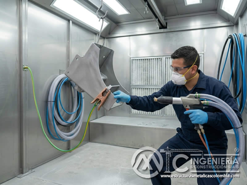 Conexión a tierra en pintura en polvo sobre pieza con sandblasting en Bogotá, Colombia. Montajes, Ingeniería y Construcción. MIC SAS. Conexión a tierra en pintura en polvo sobre pieza con sandblasting en Bogotá, Colombia. Montajes, Ingeniería y Construcción. MIC SAS.
