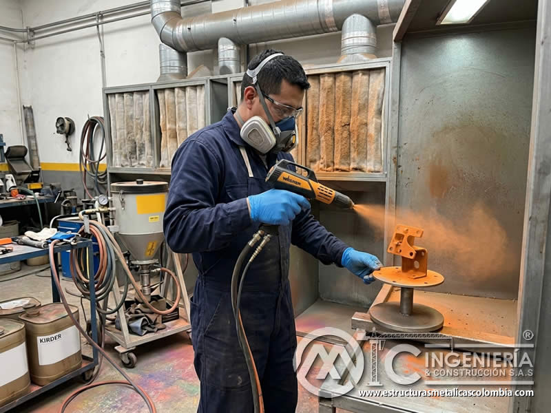 Pistola manual para pintura en polvo sobre piezas con sandblasting en Bogotá, Colombia. Montajes, Ingeniería y Construcción. MIC SAS. Pistola manual para pintura en polvo sobre piezas con sandblasting en Bogotá, Colombia. Montajes, Ingeniería y Construcción. MIC SAS.