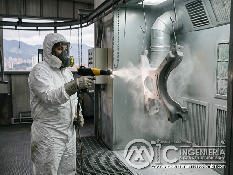 Corona ionizante en pintura electrostática sobre metal con sandblasting en Bogotá, Colombia. Montajes, Ingeniería y Construcción. MIC SAS.