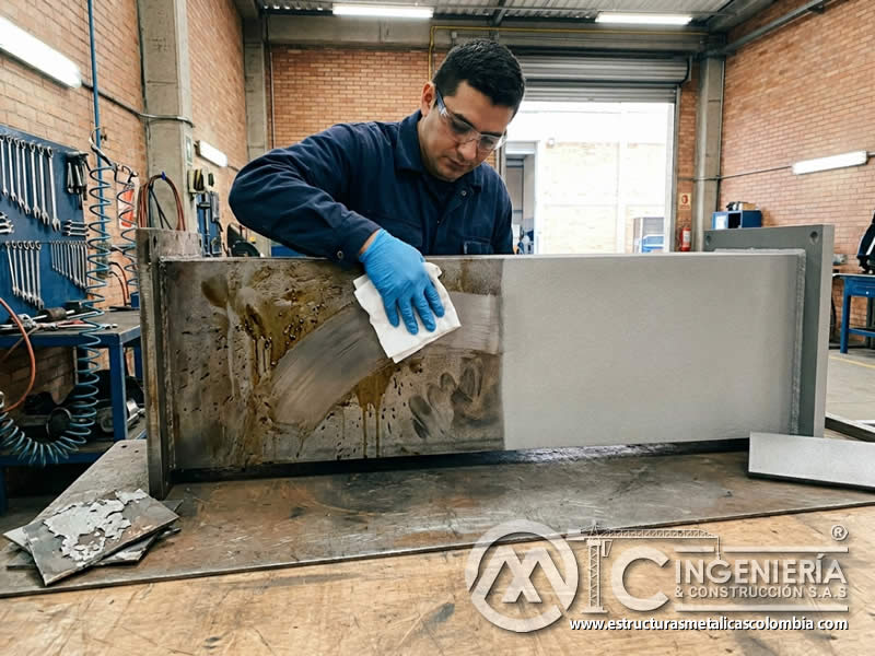 Eliminación de grasa y aceite con sandblasting en Bogotá, Colombia. Montajes, Ingeniería y Construcción. MIC SAS. Eliminación de grasa y aceite con sandblasting en Bogotá, Colombia. Montajes, Ingeniería y Construcción. MIC SAS.