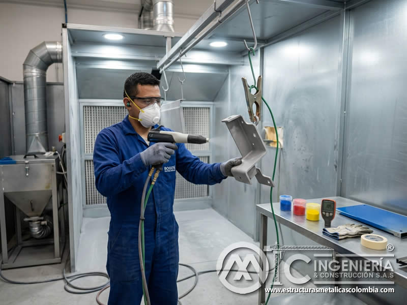 Aplicación de partículas de pintura en polvo y sandblasting en Bogotá, Colombia. Montajes, Ingeniería y Construcción. MIC SAS. Aplicación de partículas de pintura en polvo y sandblasting en Bogotá, Colombia. Montajes, Ingeniería y Construcción. MIC SAS.