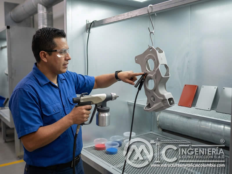 Atracción electrostática de pintura en polvo y sandblasting en Bogotá, Colombia. Montajes, Ingeniería y Construcción. MIC SAS. Atracción electrostática de pintura en polvo y sandblasting en Bogotá, Colombia. Montajes, Ingeniería y Construcción. MIC SAS.