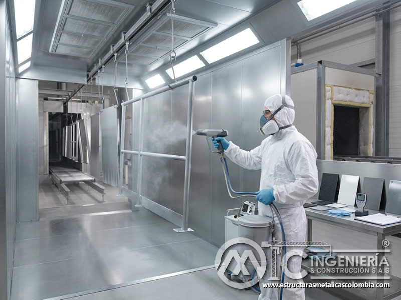 Pinturas en polvo con resistencia a decoloración y amarilleo por exposición UV, usando resinas estables, pigmentos inorgánicos, absorbedores UV y pruebas de envejecimiento acelerado en Bogotá, Colombia. Montajes, Ingeniería y Construcción. MIC SAS.