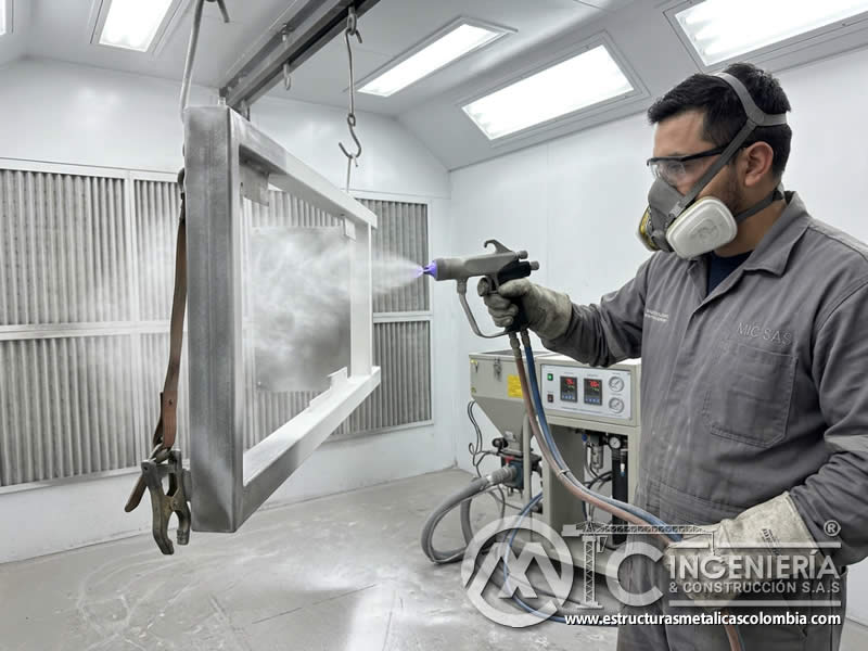 Pistola corona electrostática para pintura en polvo y recubrimiento fino de metal en Bogotá, Colombia. Montajes, Ingeniería y Construcción. MIC SAS.