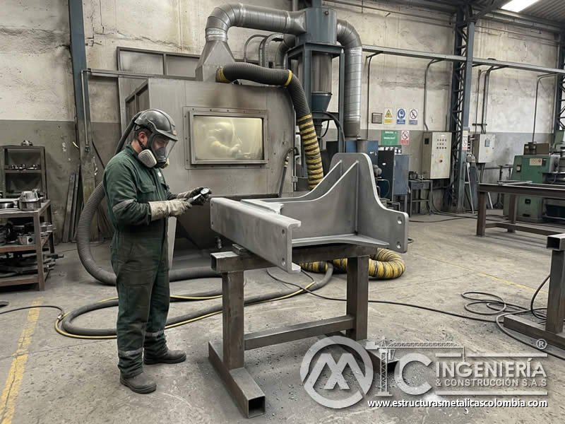 Enmascarado de pieza preparada con sandblasting en Bogotá, Colombia. Montajes, Ingeniería y Construcción. MIC SAS.
