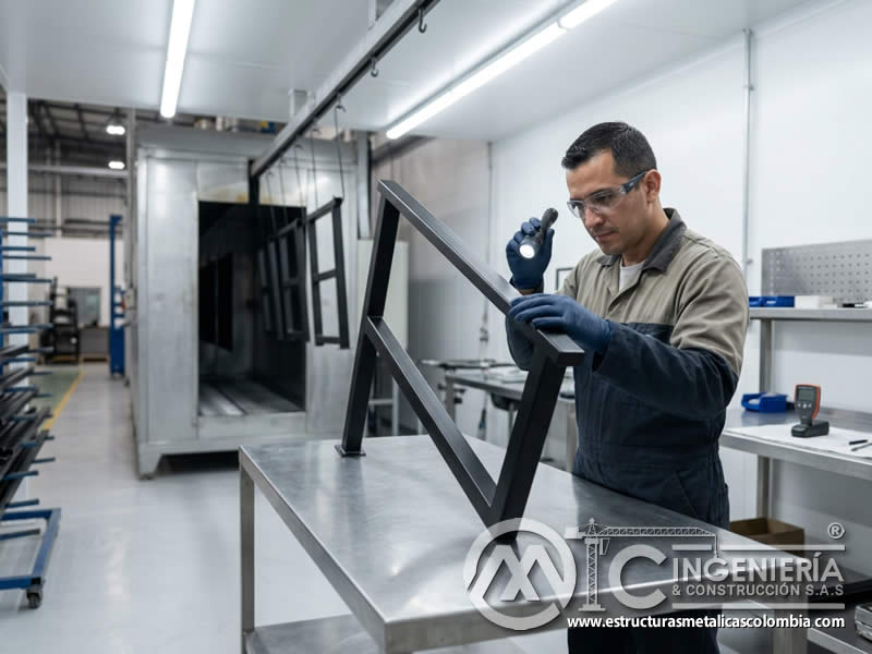 Acabado uniforme de pintura en polvo en horno de curado sobre pieza metálica final en Bogotá, Colombia. Montajes, Ingeniería y Construcción. MIC SAS. Acabado uniforme de pintura en polvo en horno de curado sobre pieza metálica final en Bogotá, Colombia. Montajes, Ingeniería y Construcción. MIC SAS.