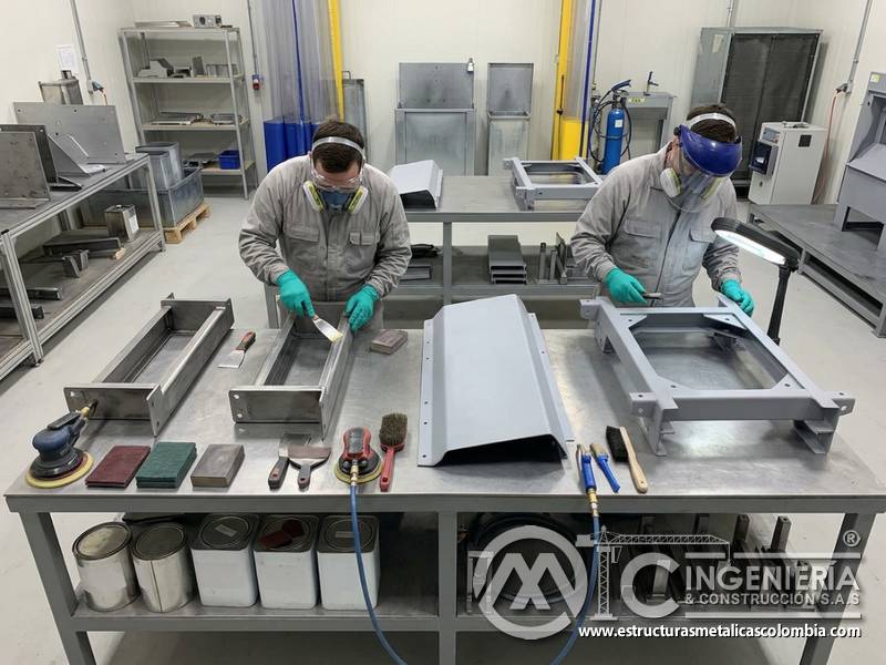 Limpieza, reparación e imprimación ajustadas al estado del metal en Bogotá, Colombia. Montajes, Ingeniería y Construcción. MIC SAS.