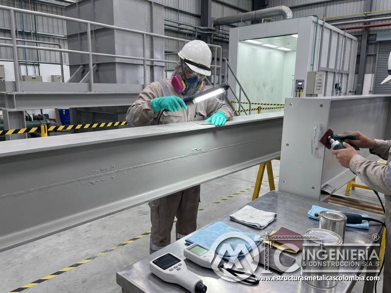 Fallas por mala preparación que afectan pintura industrial en Bogotá, Colombia. Montajes, Ingeniería y Construcción. MIC SAS.