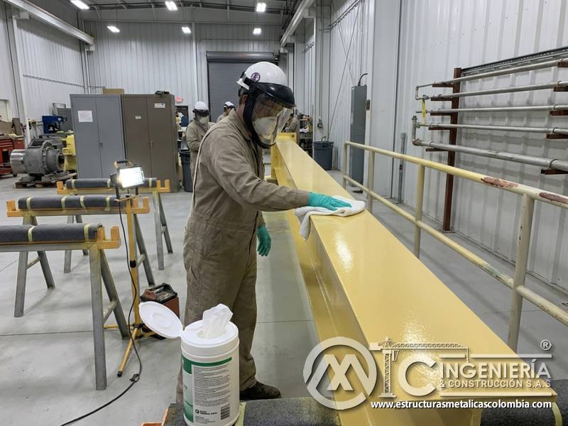 Abrasión por limpieza en pintura industrial en Bogotá, Colombia. Montajes, Ingeniería y Construcción. MIC SAS.