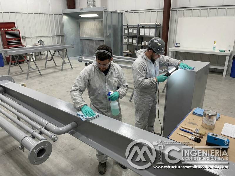 Mantenimiento post-renovación de pintura industrial en Bogotá, Colombia. Montajes, Ingeniería y Construcción. MIC SAS.