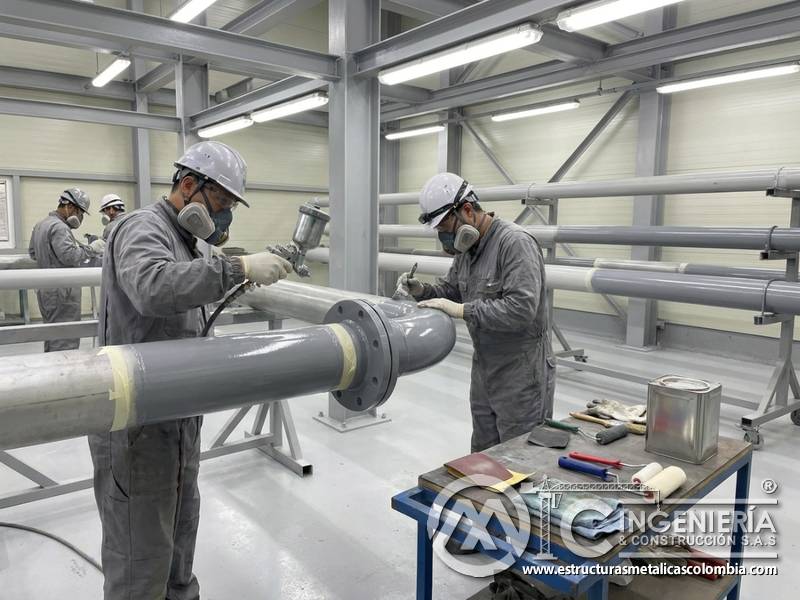 Repintado de tuberías industriales en Bogotá, Colombia. Montajes, Ingeniería y Construcción. MIC SAS.