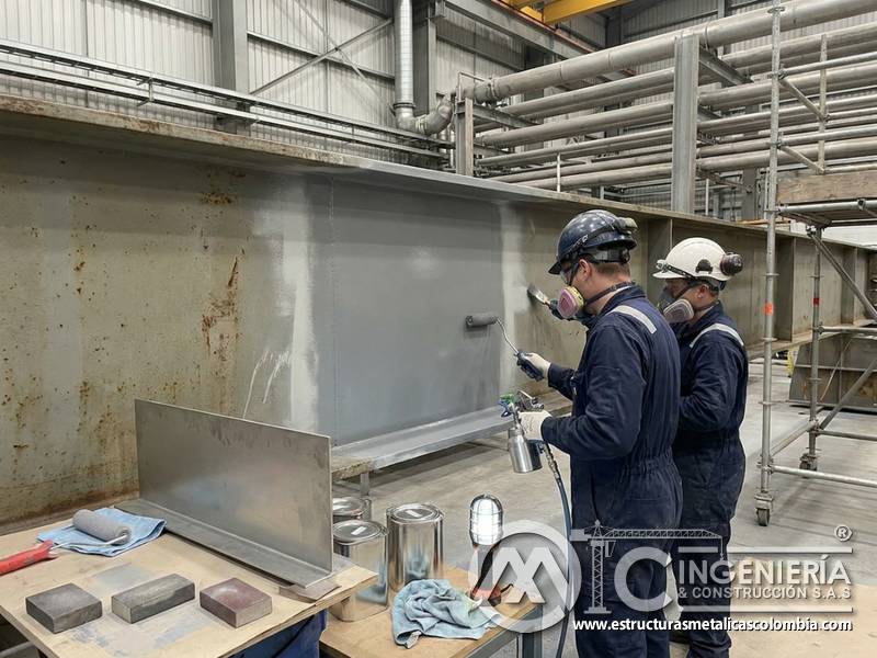 Aplicación de capa intermedia para reparación industrial en Bogotá, Colombia. Montajes, Ingeniería y Construcción. MIC SAS.