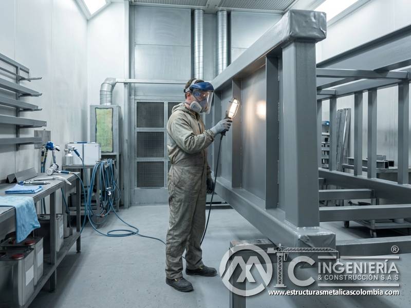 Seguridad ocular, facial y corporal en procesos de pintura industrial para estructuras metálicas en Bogotá, Colombia. Montajes, Ingeniería y Construcción. MIC SAS.