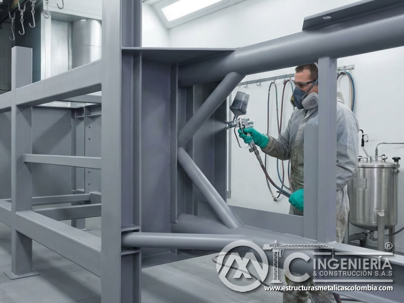 Aplicación de pintura industrial en zonas metálicas de difícil acceso por pulverización en Bogotá, Colombia. Montajes, Ingeniería y Construcción. MIC SAS.