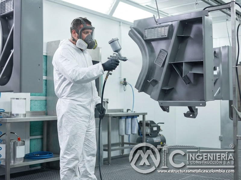 Equipo electrostático de pintura industrial para metal en Bogotá, Colombia. Montajes, Ingeniería y Construcción. MIC SAS.
